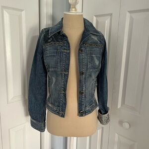 Trendy GUESS denim jacket with edgy, standout details